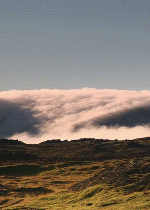 Hill and clouds in sky